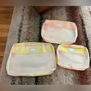 CalPak 3 piece packing cube set - yellow and pink